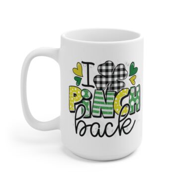 White 15 ounce mug, featuring the phrase ‘I Pinch Back’ with a shamrock in black, green, and gold