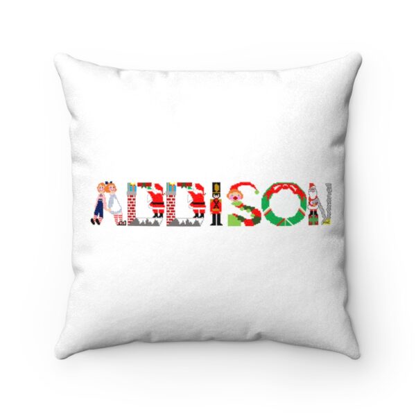 White faux suede cushion with text ‘Addison’ in colourful Christmas themed lettering