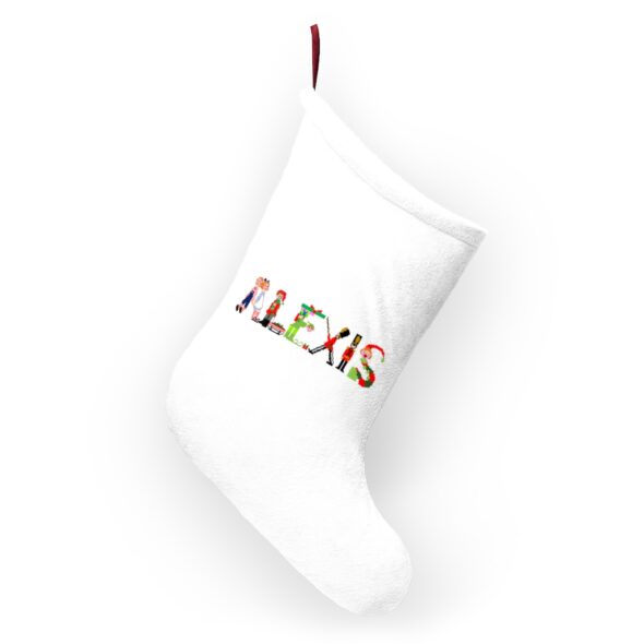 White stocking with text ‘Alexis’ in colourful Christmas themed lettering, with red hanging loop