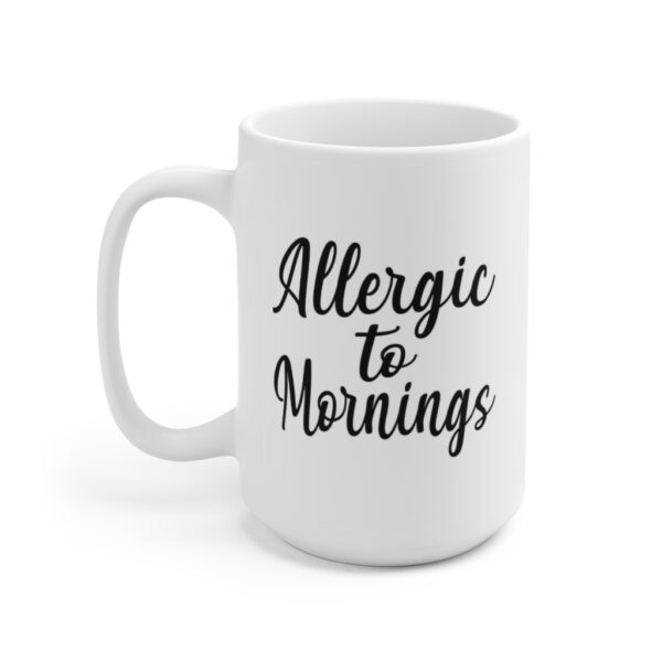 White 15 ounce mug with text ‘Allergic to Mornings’ in bold black script lettering