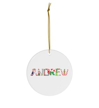 White ceramic ornament with text ‘Andrew’ in colourful Christmas themed lettering, with gold hanging loop