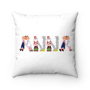 White faux suede cushion with text ‘Anna’ in colourful Christmas themed lettering