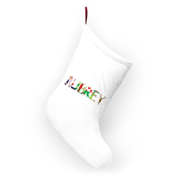 White stocking with text ‘Aubrey’ in colourful Christmas themed lettering, with red hanging loop