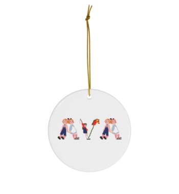 White ceramic ornament with text ‘Ava’ in colourful Christmas themed lettering, with gold hanging loop