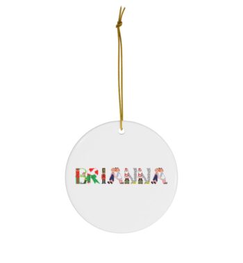 White ceramic ornament with text ‘Brianna’ in colourful Christmas themed lettering, with gold hanging loop