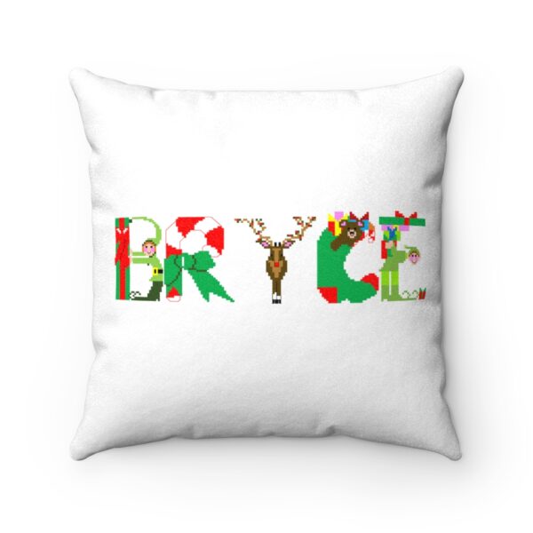 White faux suede cushion with text ‘Bryce’ in colourful Christmas themed lettering
