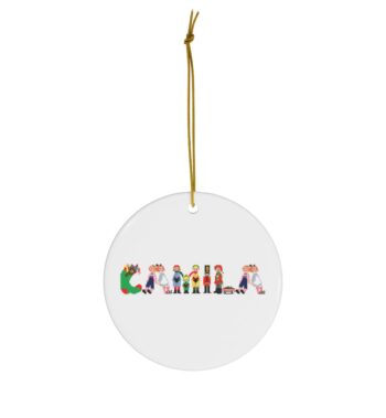 White ceramic ornament with text ‘Camila’ in colourful Christmas themed lettering, with gold hanging loop