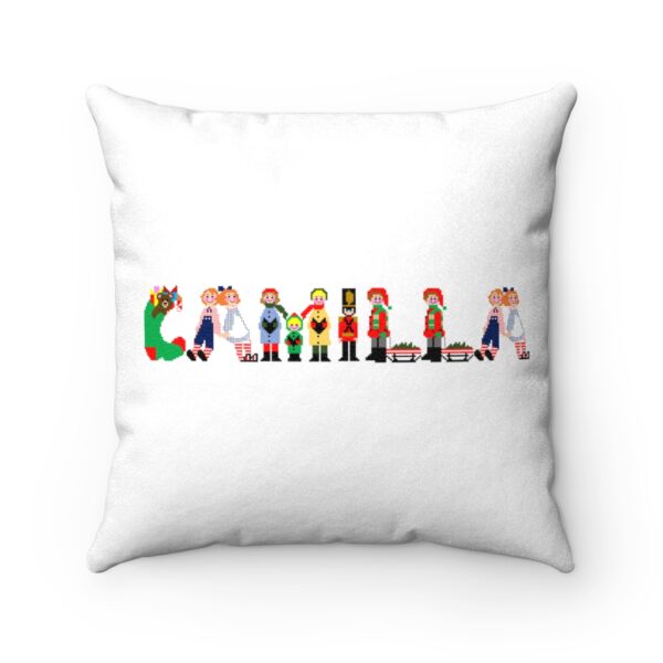 White faux suede cushion with text ‘Camilla’ in colourful Christmas themed lettering