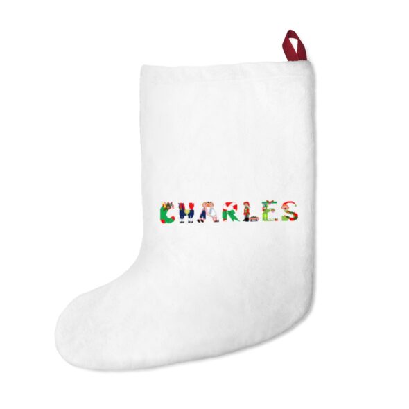 White stocking with text ‘Charles’ in colourful Christmas themed lettering, with red hanging loop