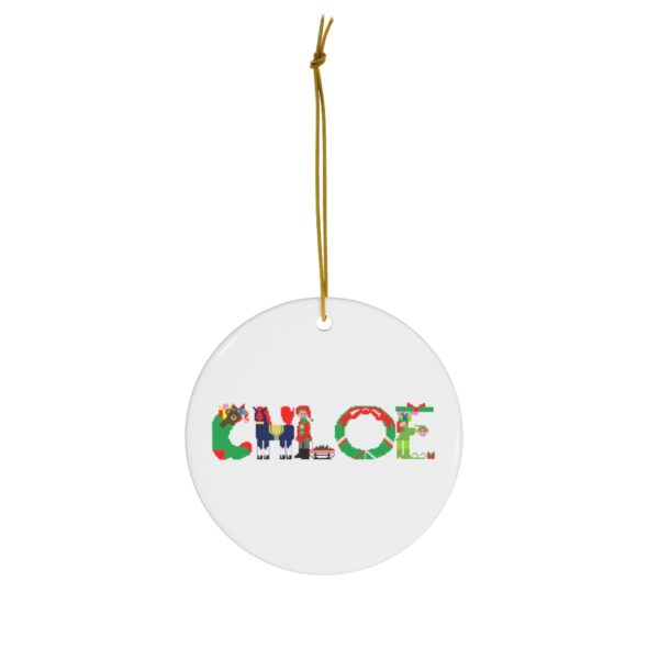 White ceramic ornament with text ‘Chloe’ in colourful Christmas themed lettering, with gold hanging loop