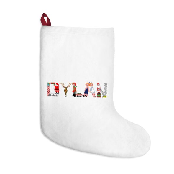 White stocking with text ‘Dylan’ in colourful Christmas themed lettering, with red hanging loop