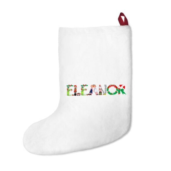White stocking with text ‘Eleanor’ in colourful Christmas themed lettering, with red hanging loop