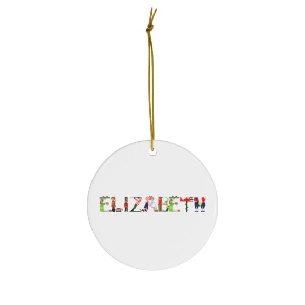 White ceramic ornament with text ‘Elizabeth’ in colourful Christmas themed lettering, with gold hanging loop