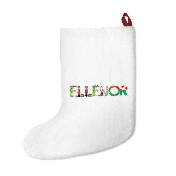 White stocking with text ‘Ellenor’ in colourful Christmas themed lettering, with red hanging loop