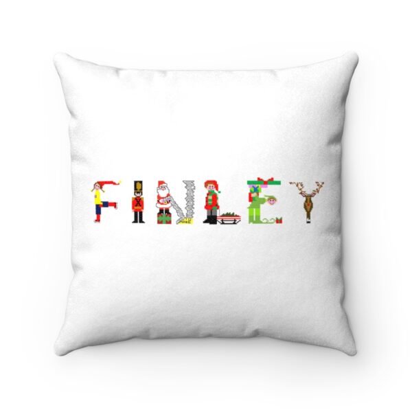 White faux suede cushion with text ‘Finley’ in colourful Christmas themed lettering