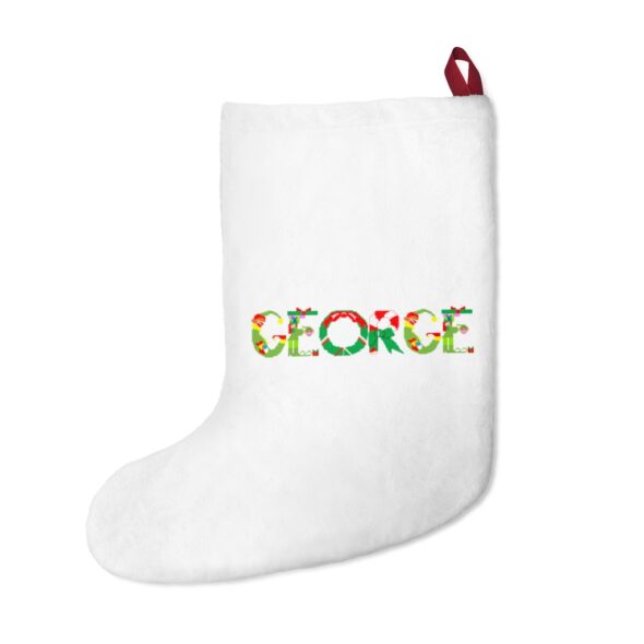 White stocking with text ‘George’ in colourful Christmas themed lettering, with red hanging loop