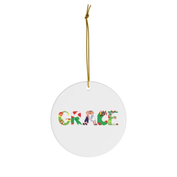 White ceramic ornament with text ‘Grace’ in colourful Christmas themed lettering, with gold hanging loop