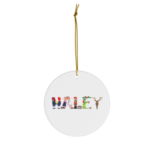 White ceramic ornament with text ‘Haley’ in colourful Christmas themed lettering, with gold hanging loop