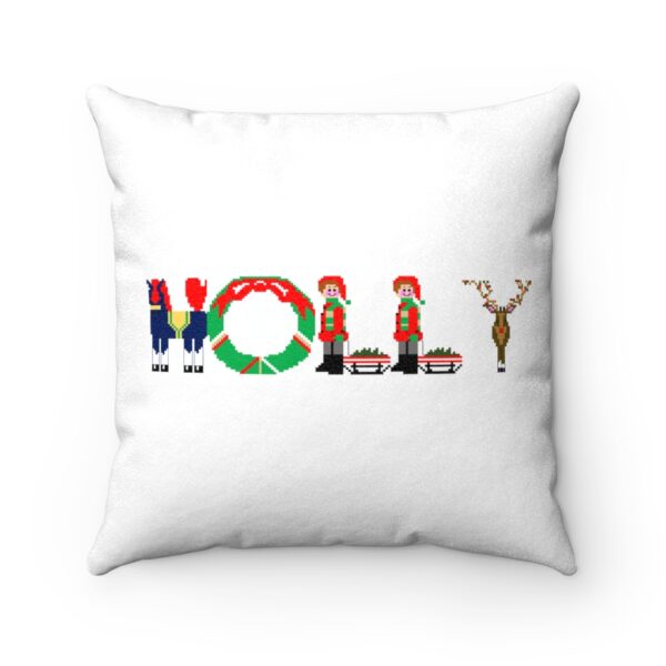 White faux suede cushion with text ‘Holly’ in colourful Christmas themed lettering