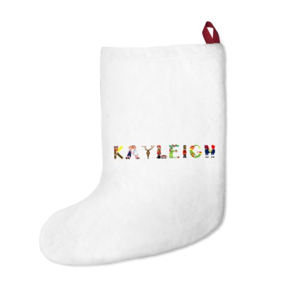 White stocking with text ‘Kayleigh’ in colourful Christmas themed lettering, with red hanging loop