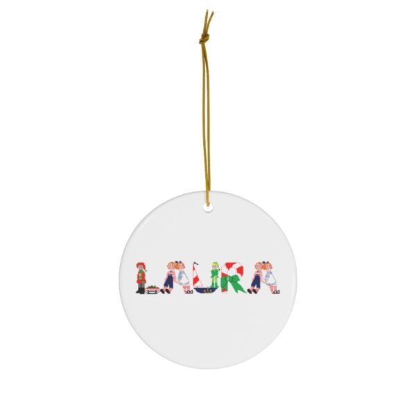 White ceramic ornament with text ‘Laura’ in colourful Christmas themed lettering, with gold hanging loop