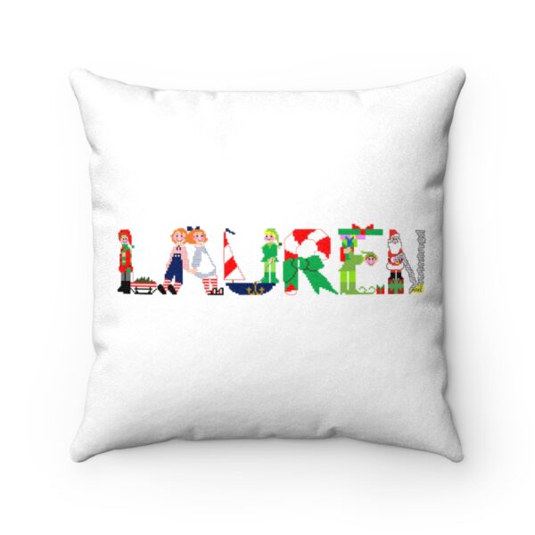 White faux suede cushion with text ‘Lauren’ in colourful Christmas themed lettering