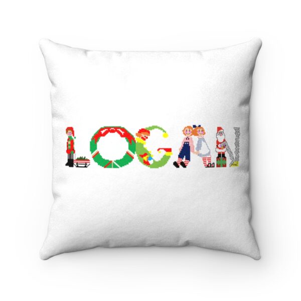 White faux suede cushion with text ‘Logan’ in colourful Christmas themed lettering