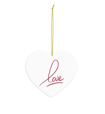 White heart shaped ceramic ornament, featuring the word love in a red script print