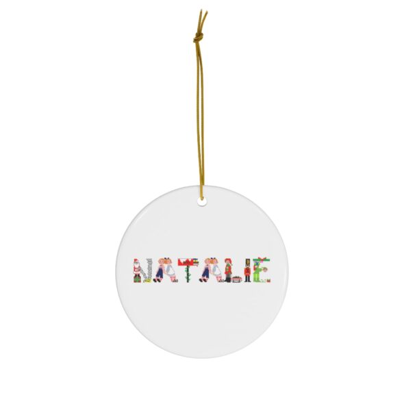 White ceramic ornament with text ‘Natalie’ in colourful Christmas themed lettering, with gold hanging loop