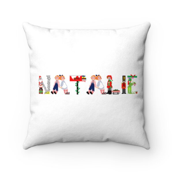 White faux suede cushion with text ‘Natalie’ in colourful Christmas themed lettering