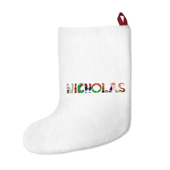 White stocking with text ‘Nicholas’ in colourful Christmas themed lettering, with red hanging loop