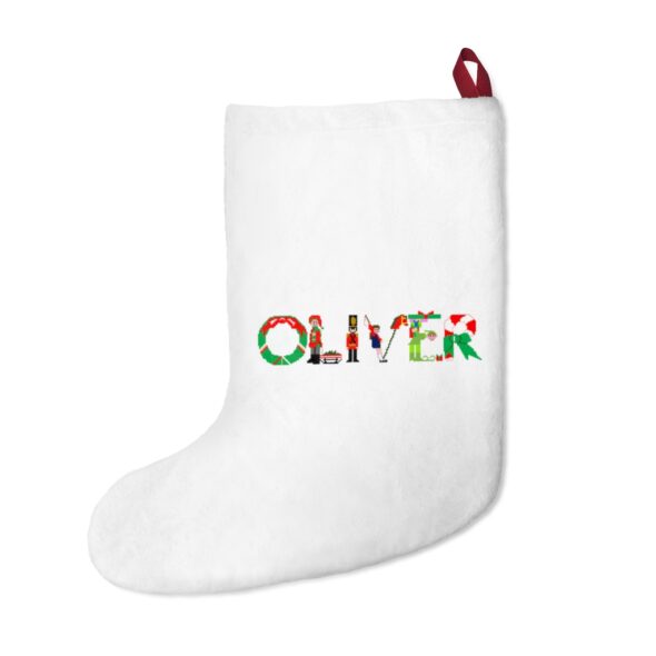 White stocking with text ‘Oliver’ in colourful Christmas themed lettering, with red hanging loop