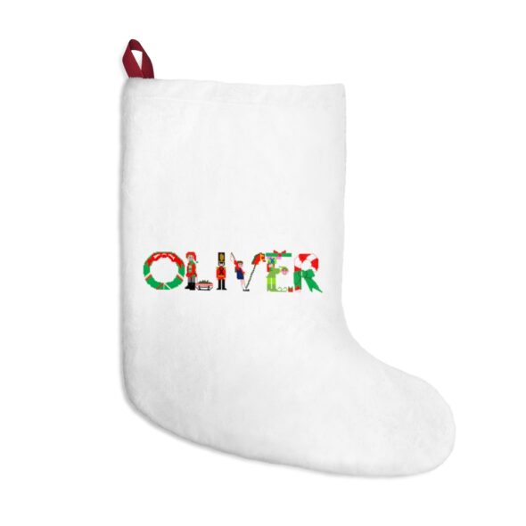 White stocking with text ‘Oliver’ in colourful Christmas themed lettering, with red hanging loop