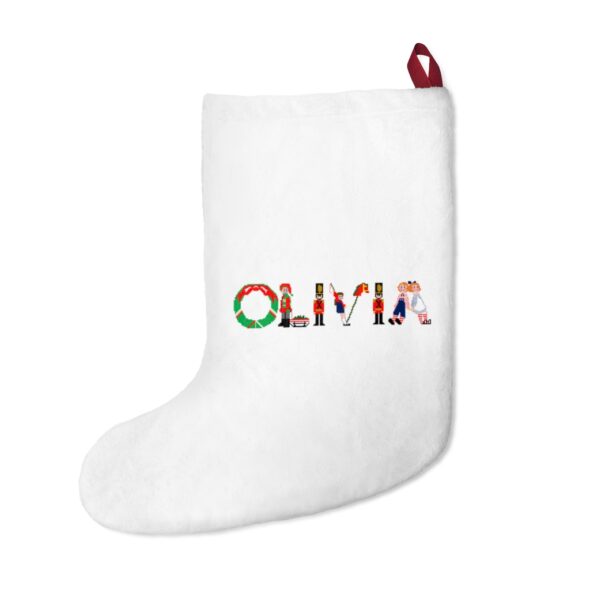 White stocking with text ‘Olivia’ in colourful Christmas themed lettering, with red hanging loop
