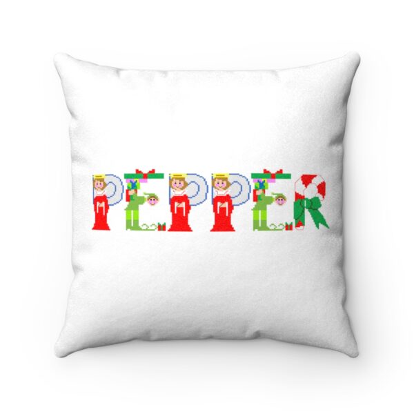 White faux suede cushion with text ‘Pepper’ in colourful Christmas themed lettering
