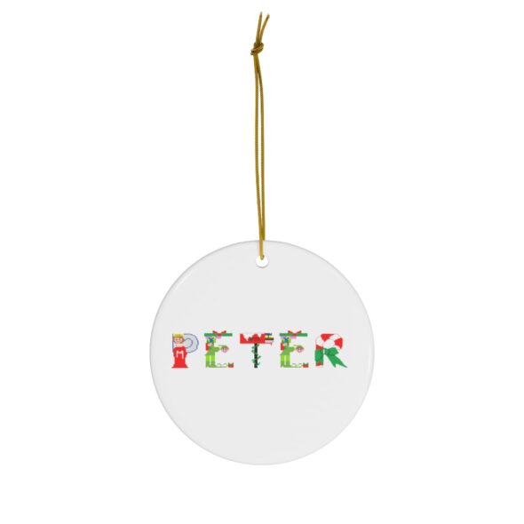 White ceramic ornament with text ‘Peter’ in colourful Christmas themed lettering, with gold hanging loop