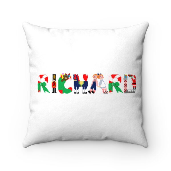 White faux suede cushion with text ‘Richard’ in colourful Christmas themed lettering