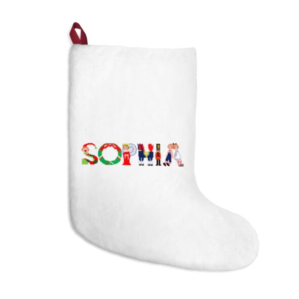 White stocking with text ‘Sophia’ in colourful Christmas themed lettering, with red hanging loop