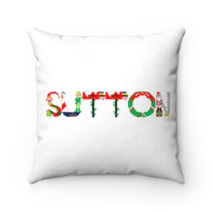 White faux suede cushion with text ‘Sutton’ in colourful Christmas themed lettering
