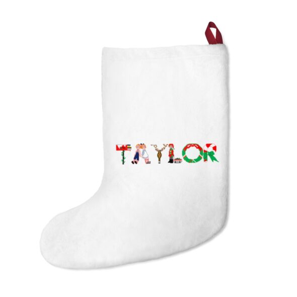 White stocking with text ‘Taylor’ in colourful Christmas themed lettering, with red hanging loop