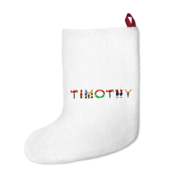 White stocking with text ‘Timothy’ in colourful Christmas themed lettering, with red hanging loop