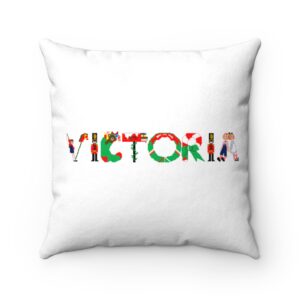 White faux suede cushion with text ‘Victoria’ in colourful Christmas themed lettering