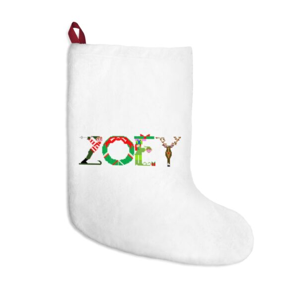 White stocking with text ‘Zoey’ in colourful Christmas themed lettering, with red hanging loop