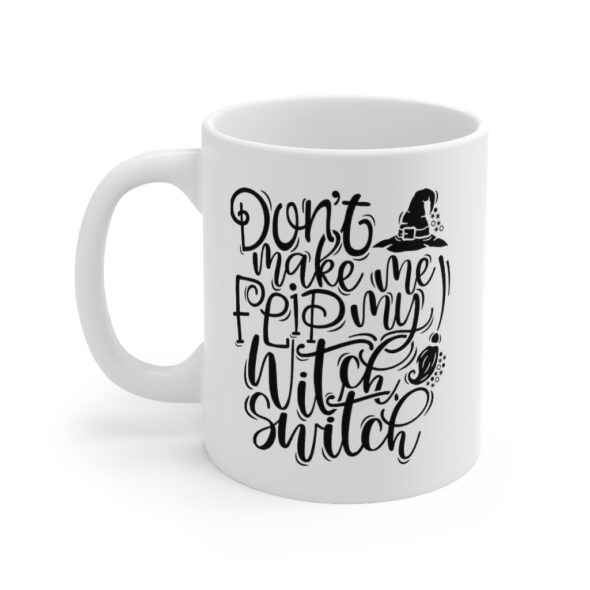White 11 ounce mug featuring the words 'Don't make me flip my witch switch' in a white swirly font along with a witch's hat and broomstick